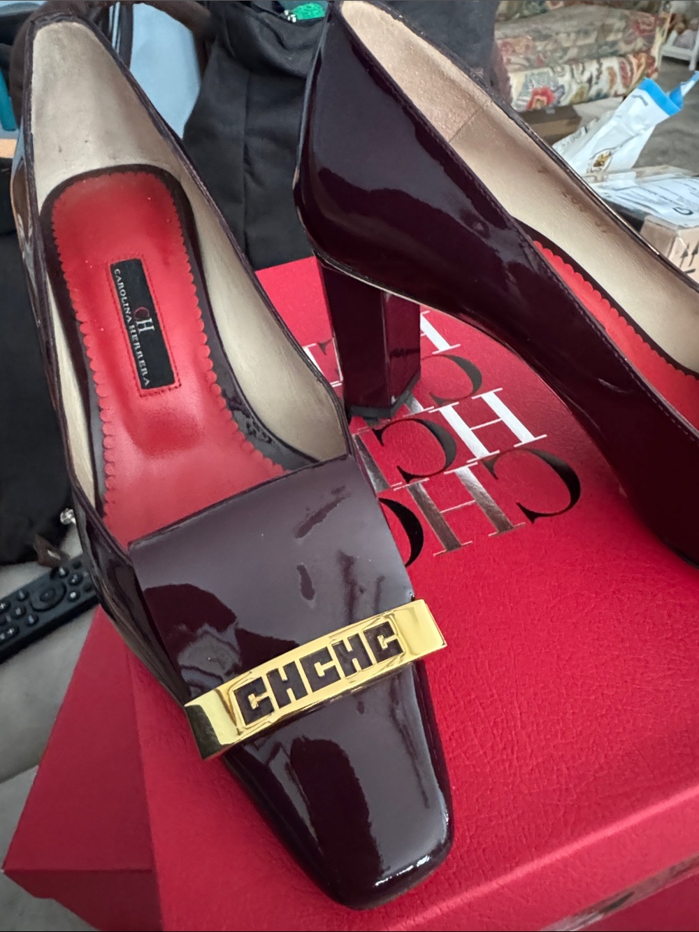 Carolina Herrera Burgundy Patent Block Heel Pumps with Gold CH Logo